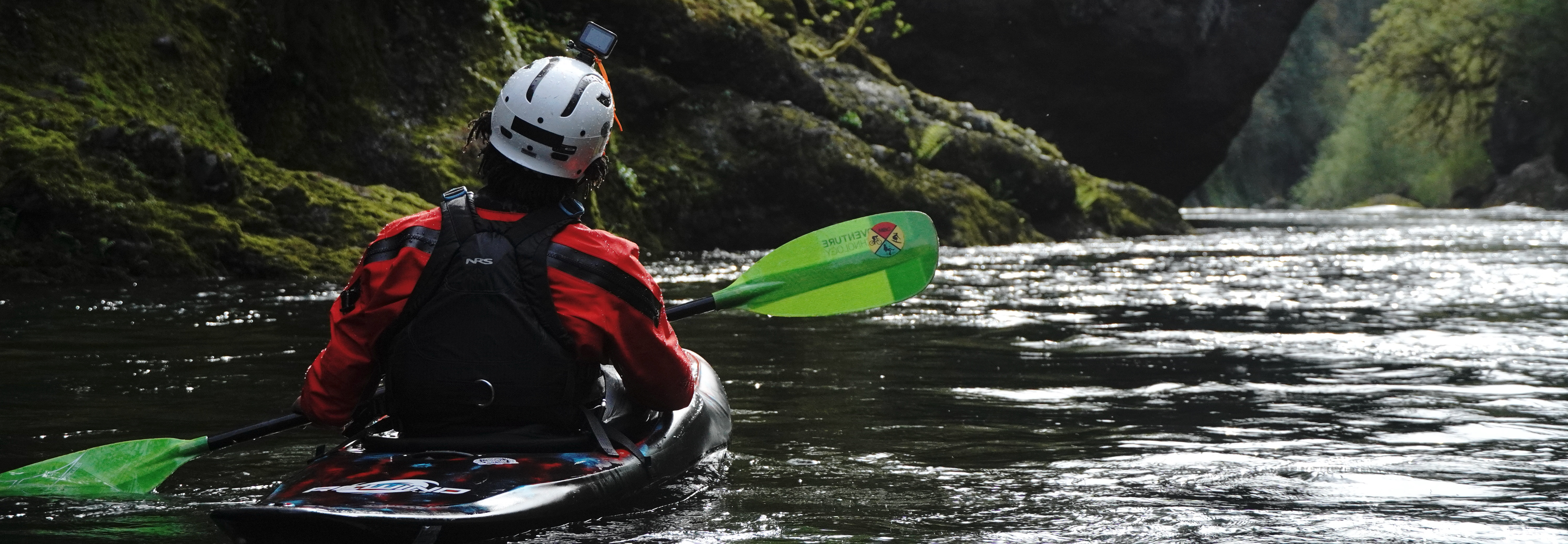 A kayaker on a river.